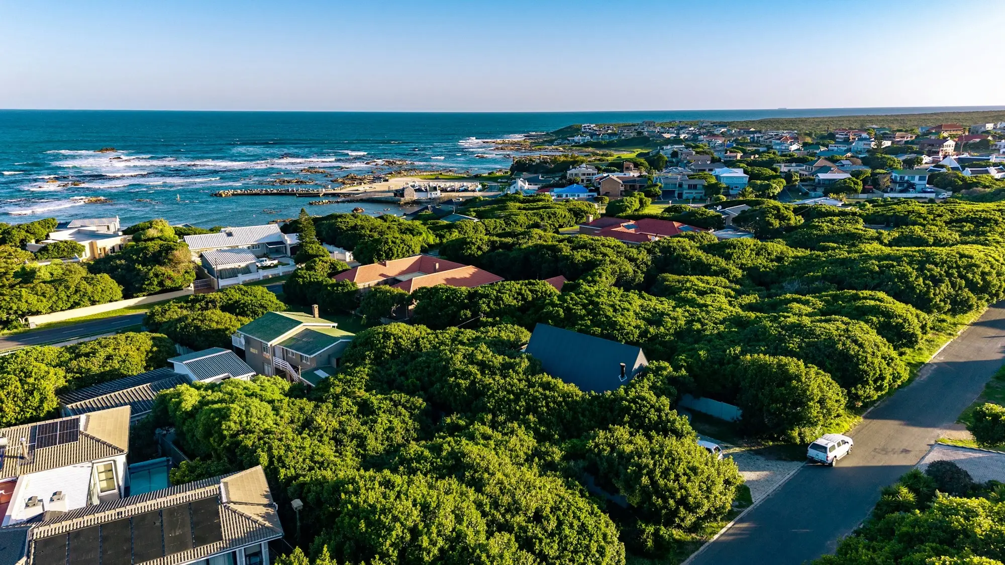 Aerial view over Van Dyks Bay towards the harbour and the open ocean